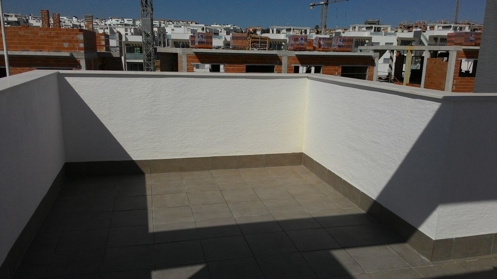 Custom rooftop storage solution in white aluminum, Costa Blanca.