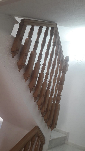 Custom glass balcony balustrade with stainless steel posts